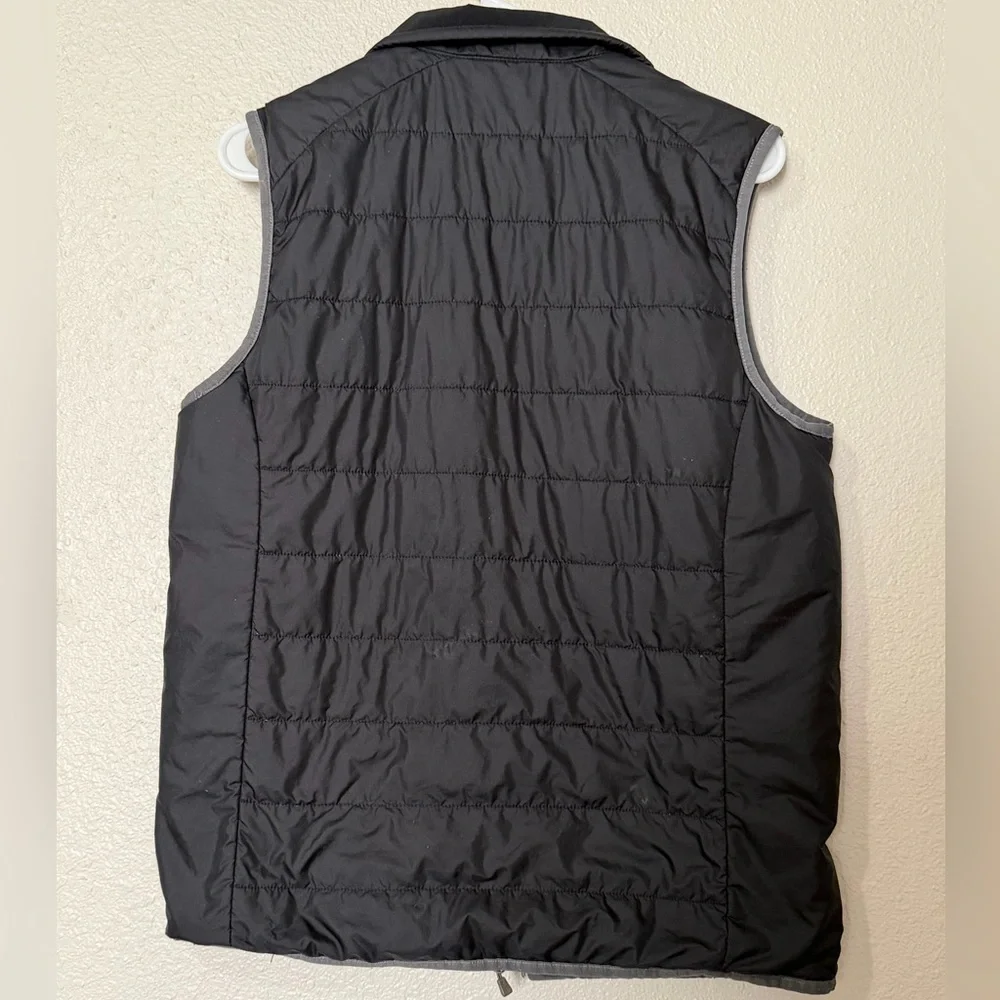 The North Face Men’s Reversible Puffer Fleece Vest Black/Grey Size: Small